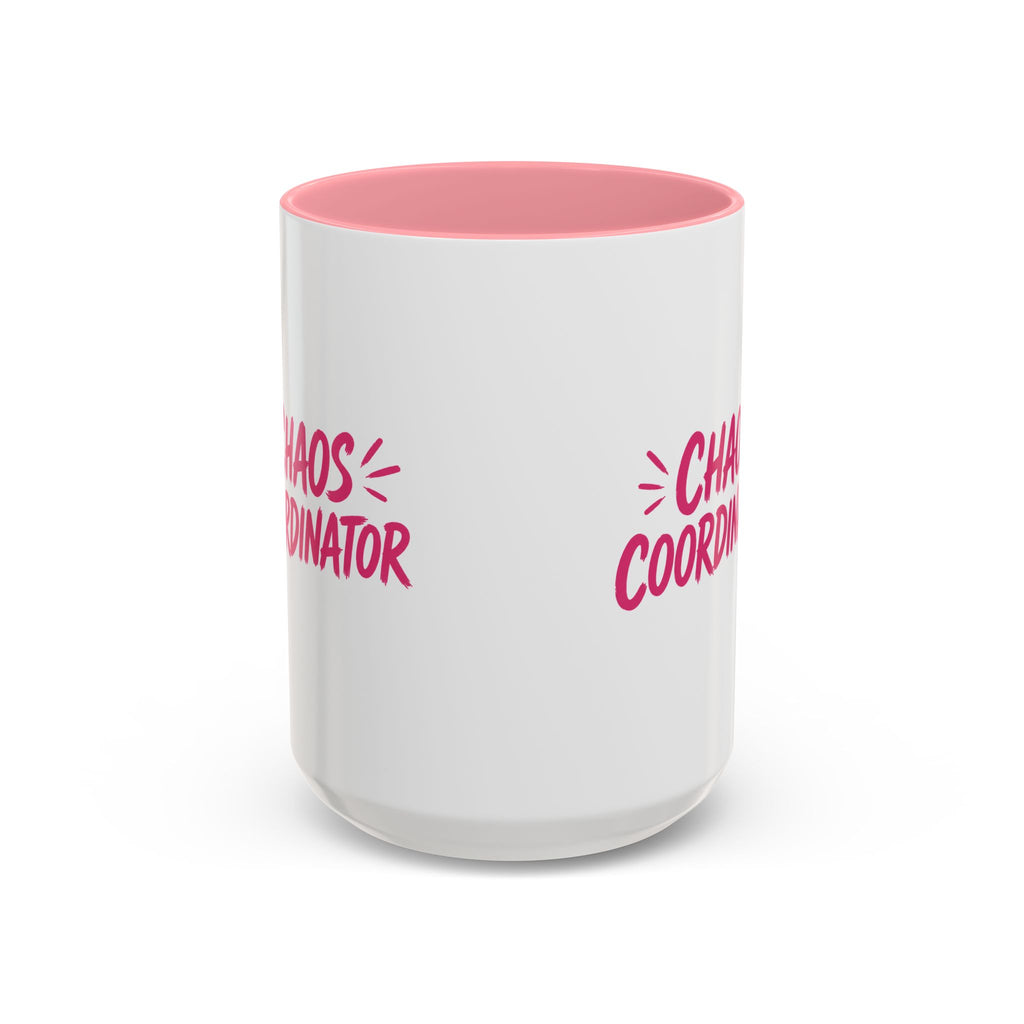 White coffee mug with pink interior featuring bold pink Chaos Coordinator text design